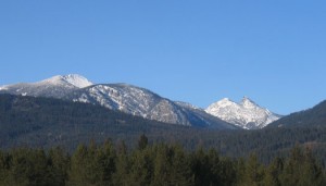 Heron is just to the south of the proposed Scotchman Peaks Wilderness (www.scotchmanpeaks.org) The jagged peak on the right is Sawtooth Mountain. The bulky mountain on the left is Clayton Peak. 